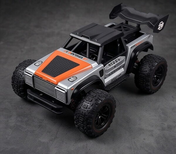 TASTIEN Racing 1:14 4WD High-Speed RC Climbing Truck TASTIEN Racing 1:14 scale 4WD RC climbing truck in silver and orange, three-quarter front view