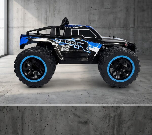 Yile Storm RC Truck - Blue Studio Side Blue Yile Storm RC truck photographed side-on against a grey concrete studio wall